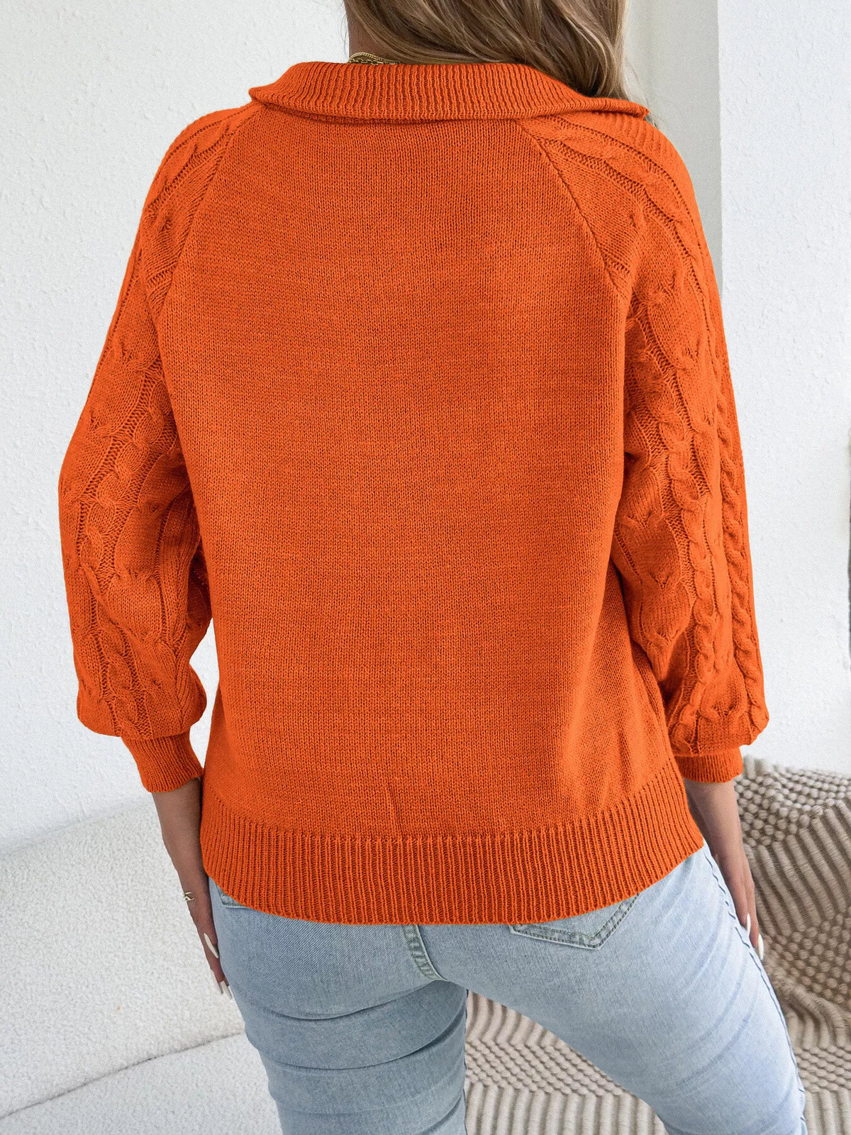 Quarter-zip cable knit sweater, back view
