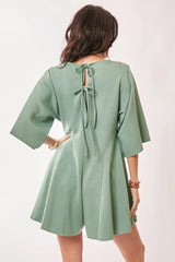 Trendsi Davi & Dani Solid Draped Sleeve Ties Back Skort Romper -