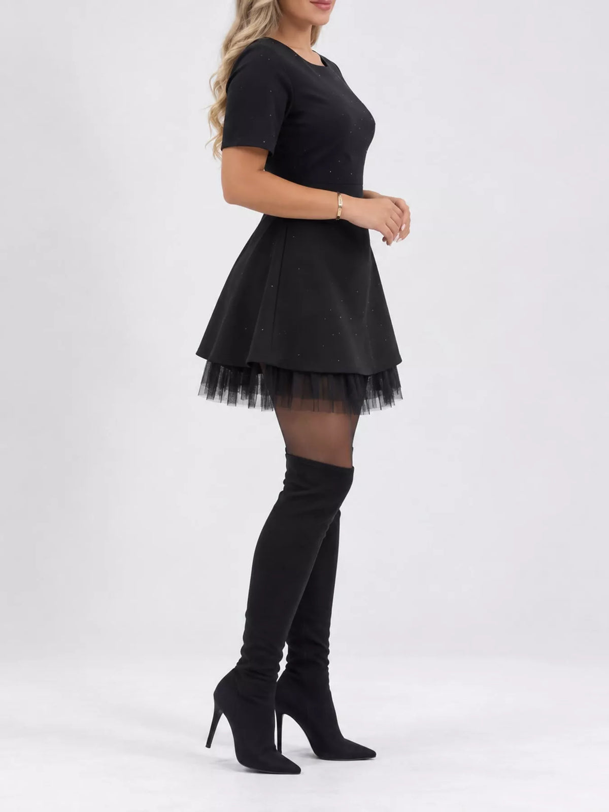 Black rhinestone a line mini dress with tulle hem, side view