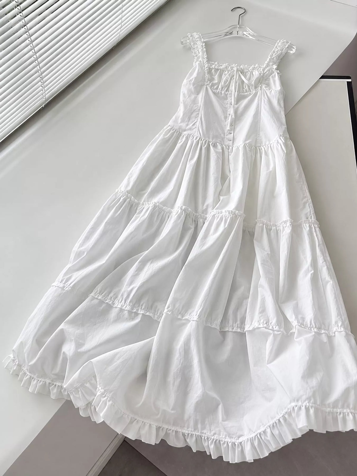 Women's Ruffled Square Neck Tiered Maxi Dress in white — flat lay view