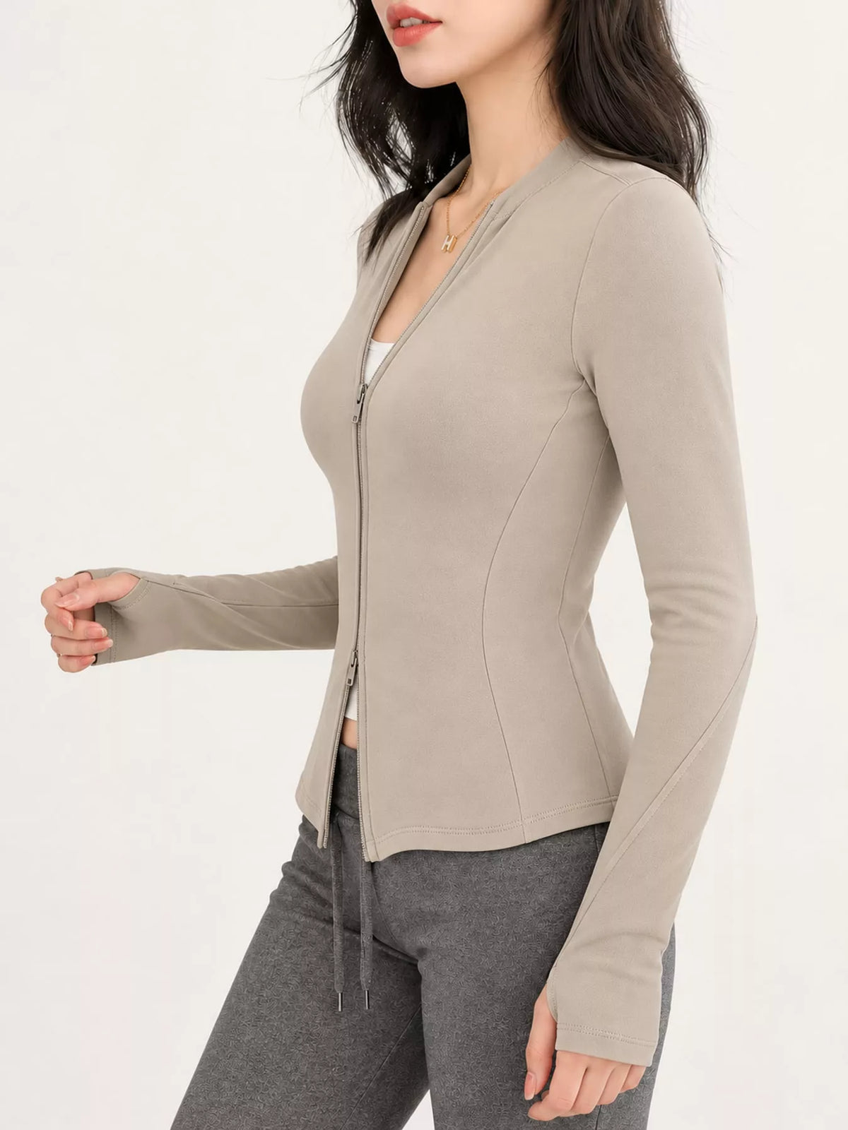 Beige slim-fit zip-up long sleeve jacket — side view