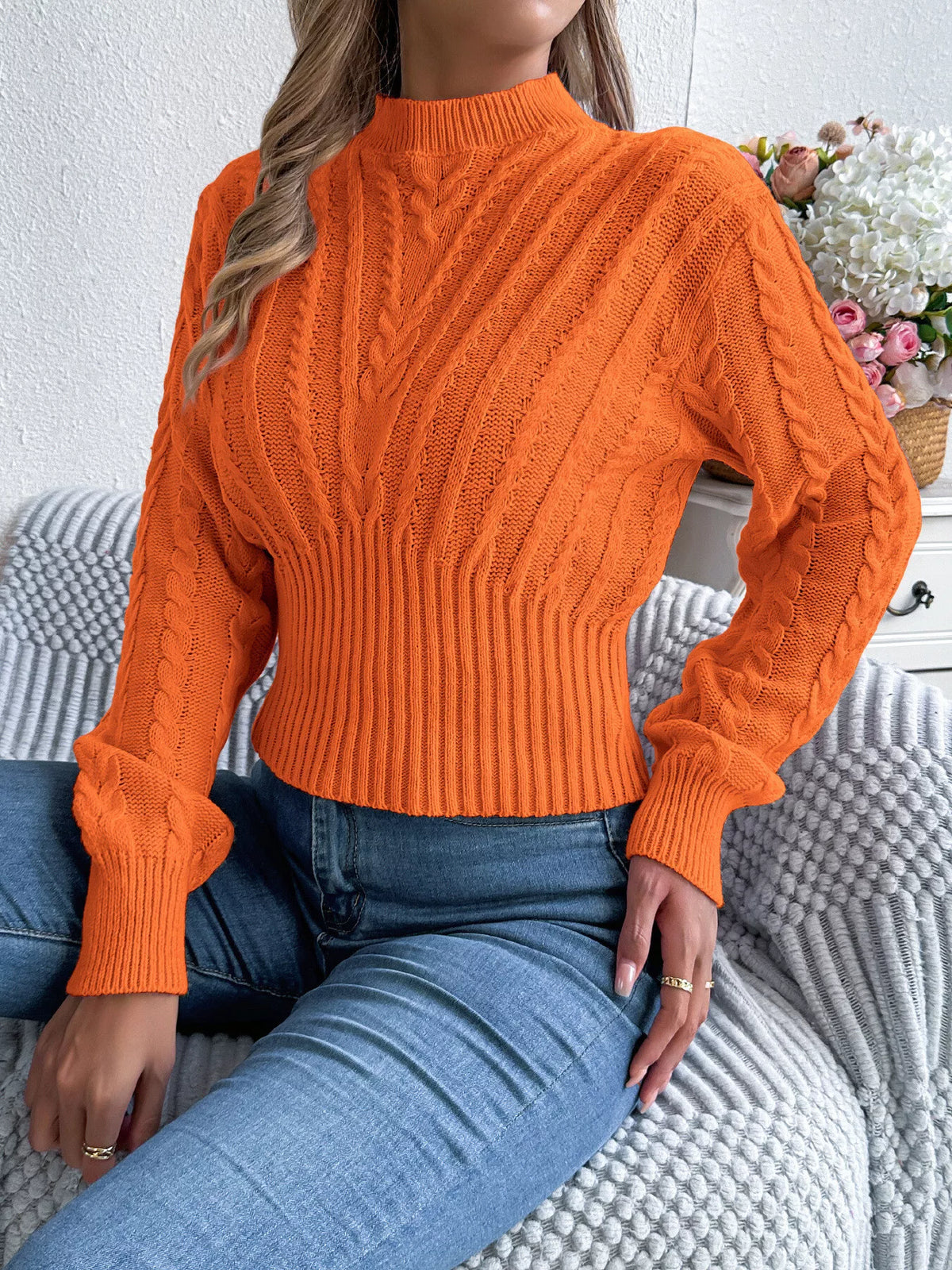 Orange cable knit mock neck sweater