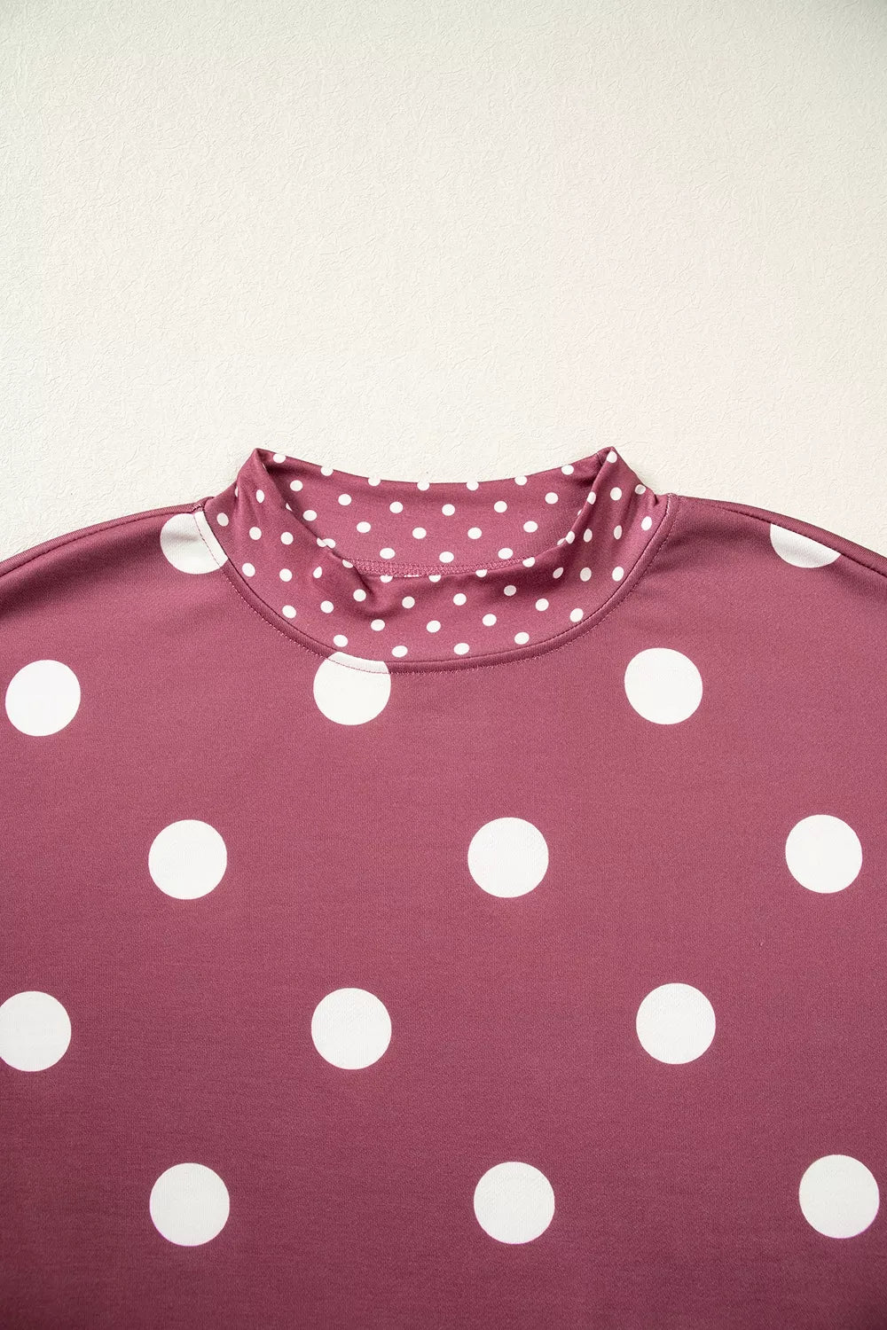 Burgundy polka dot tunic sweatshirt, mock neckline detail
