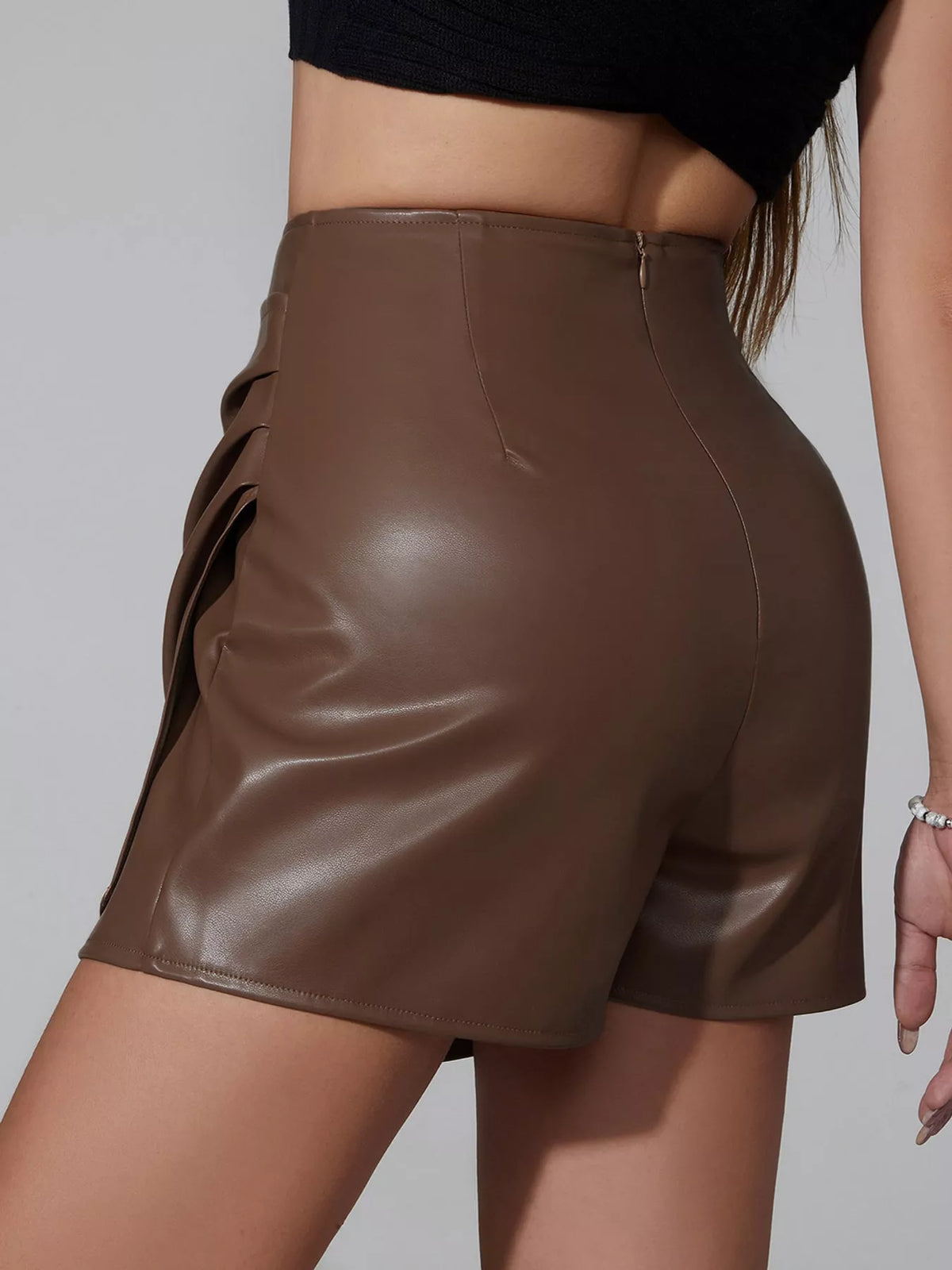 High-Waisted Ruched Faux Leather Skort — back view