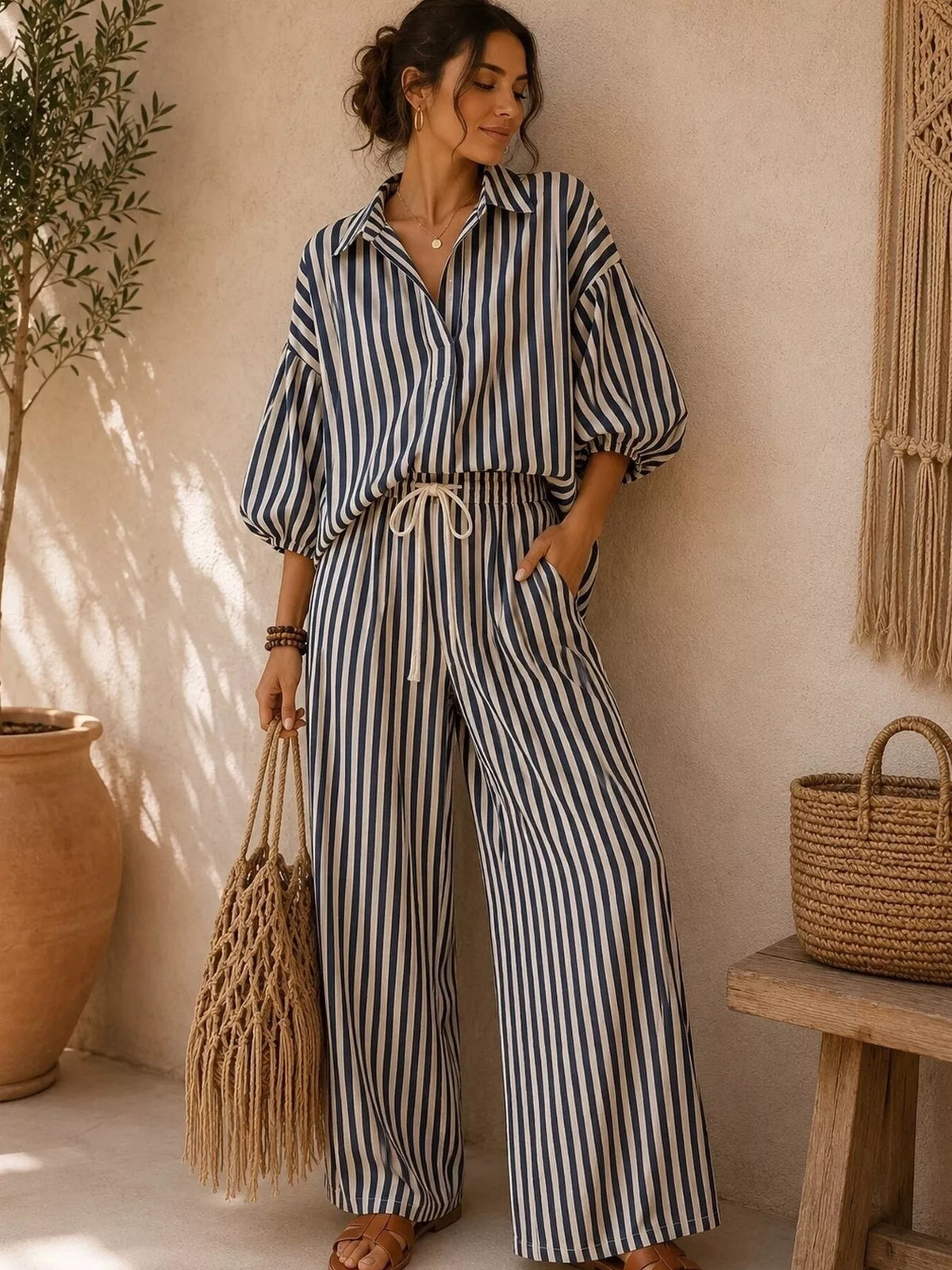 Black striped shirt and wide-leg pants set, front view