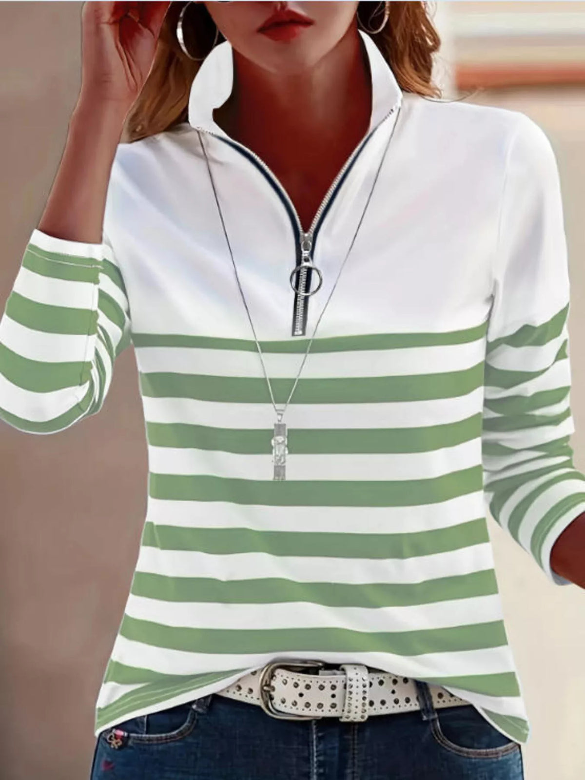Green and white quarter-zip striped top, front view