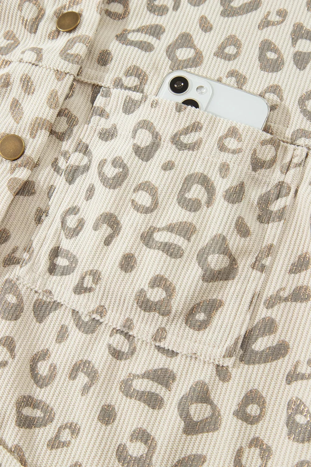 Beige leopard corduroy button-front jacket, chest pocket detail.