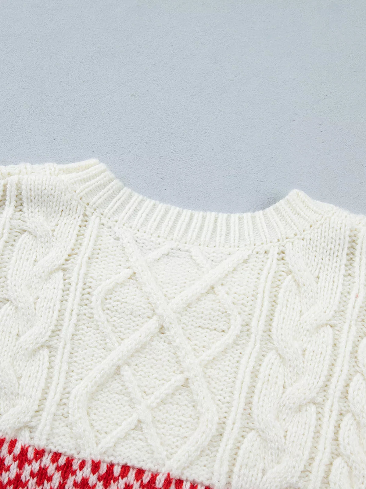 Reindeer Cable Knit Christmas Sweater in cream, construction detail