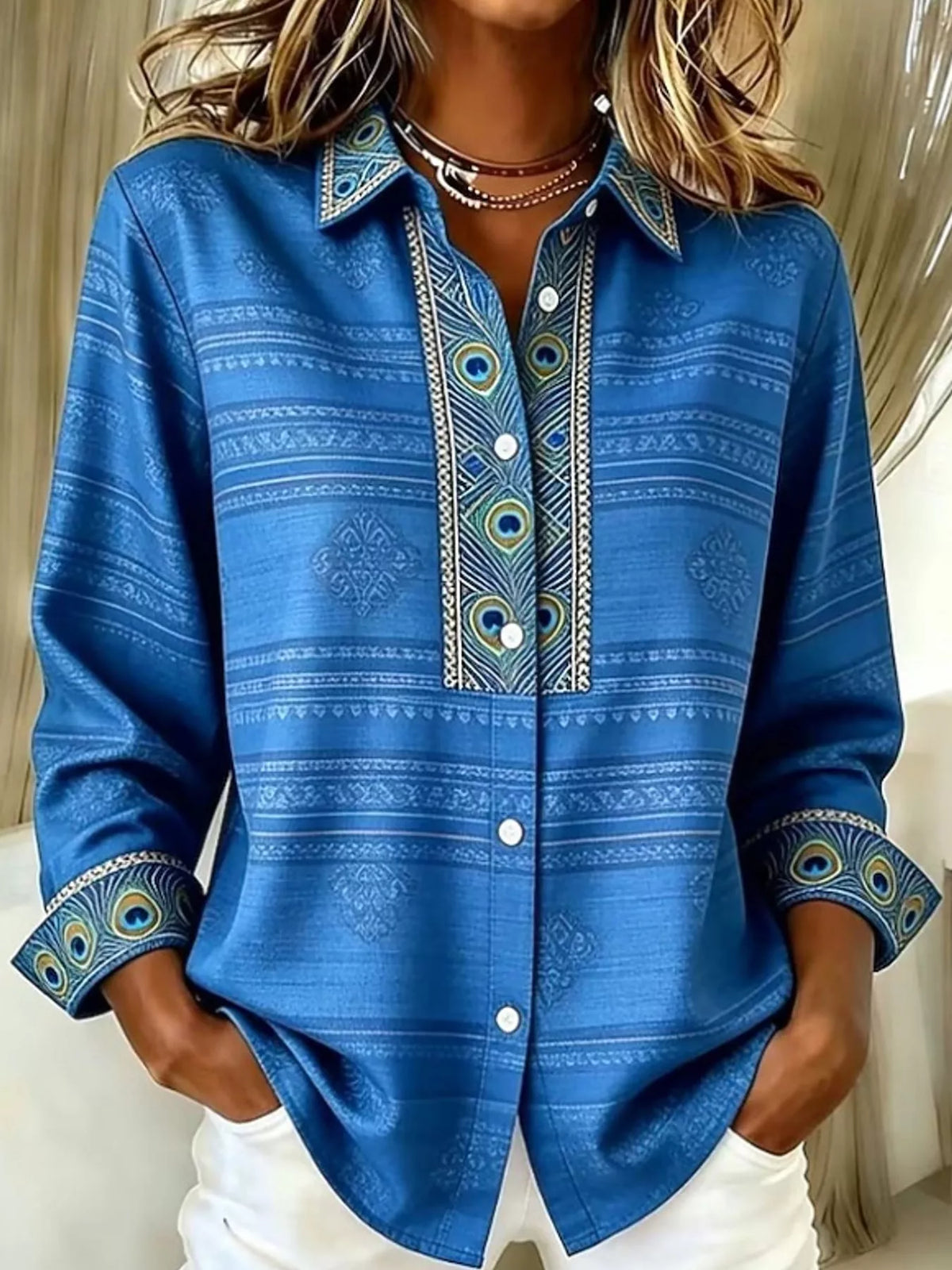 Blue polo-style long sleeve shirt