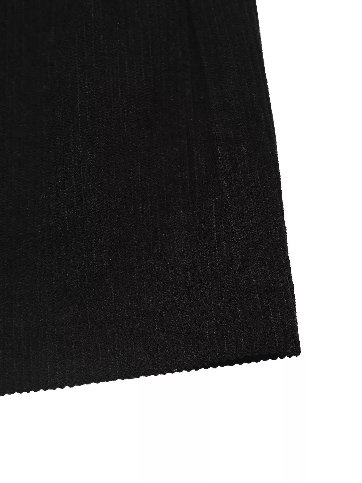 Black corduroy button-front midi skirt, hem detail