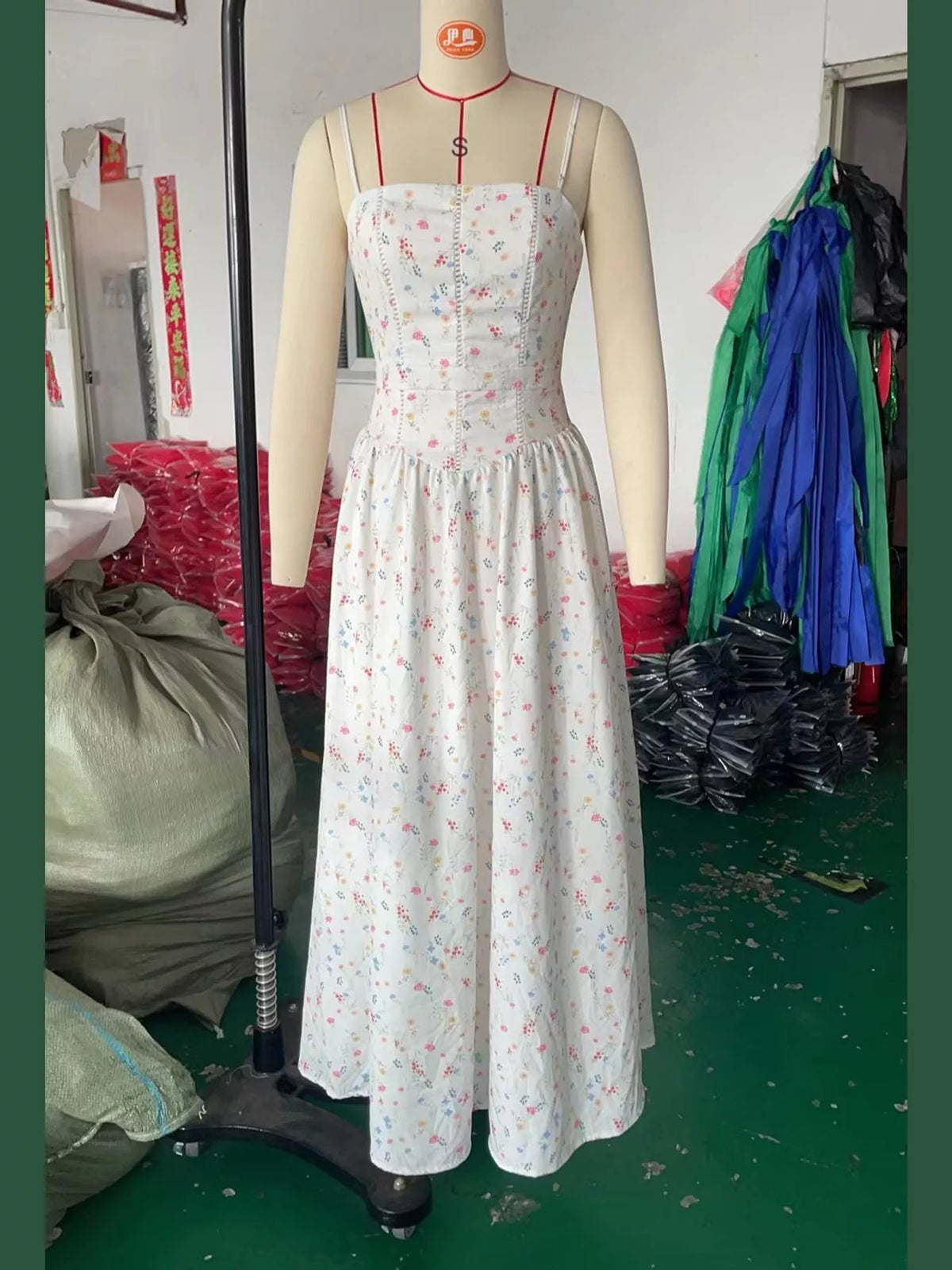 Women's Paneled Bodice Gathered Midi Dress in small floral — mannequin front view
