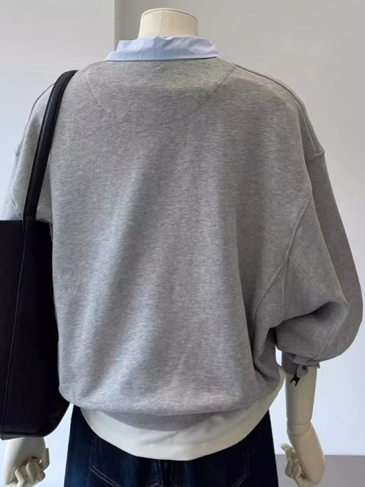 Gray polo-collar layered-look sweatshirt, back view
