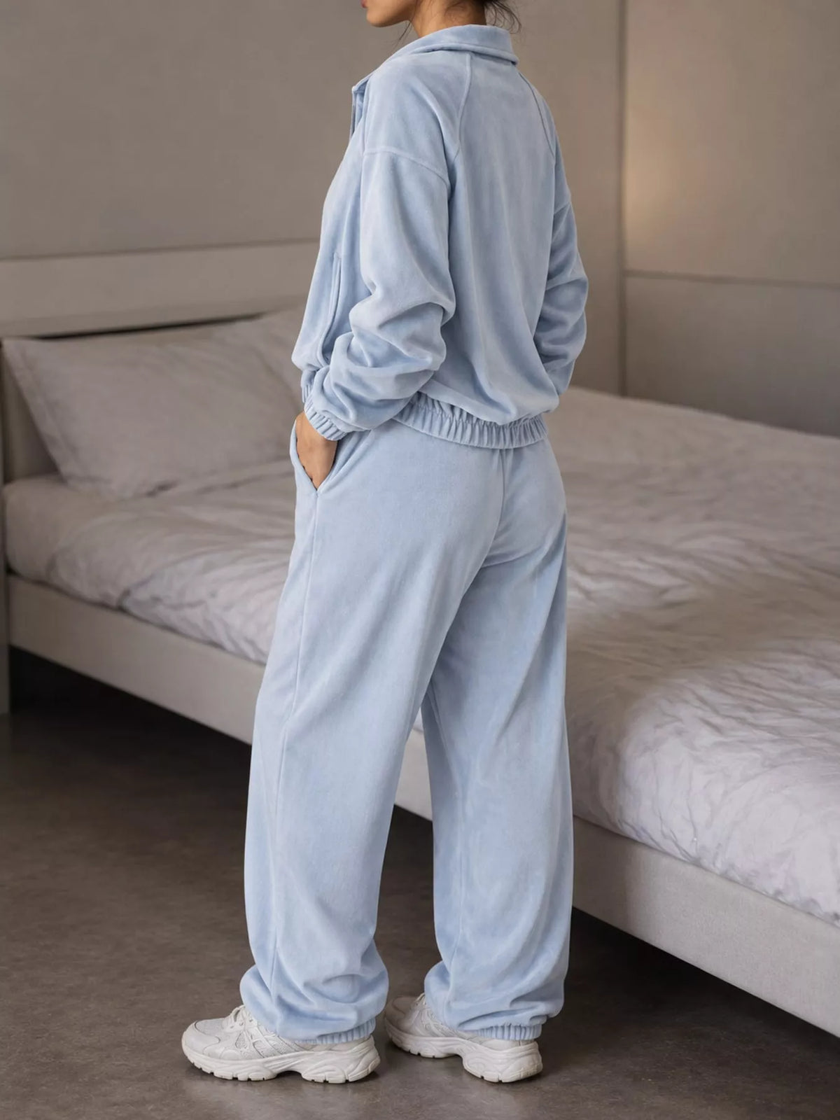 Light blue zip-up outerwear and pants set — back view