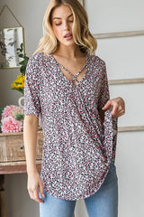 Trendsi Heimish Full Size Short Sleeve Crisscross Animal Babydoll Top Plus Size - Shirts