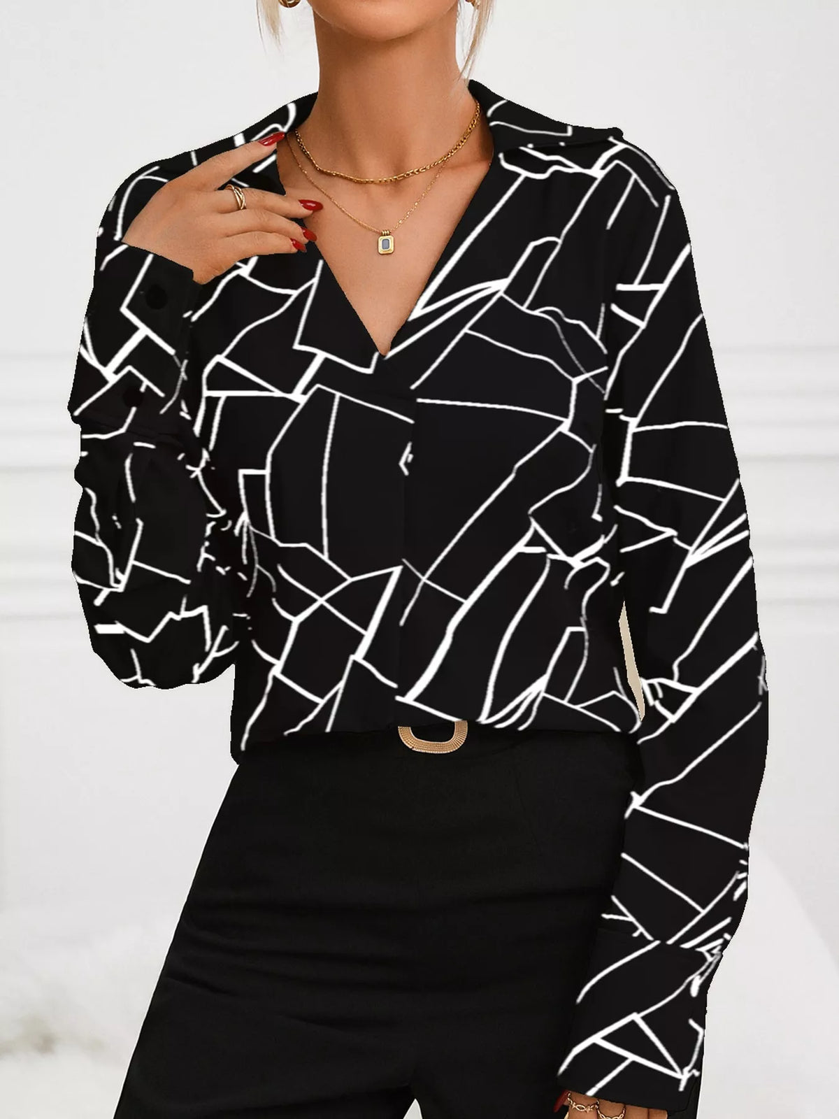Black geometric print long sleeve blouse