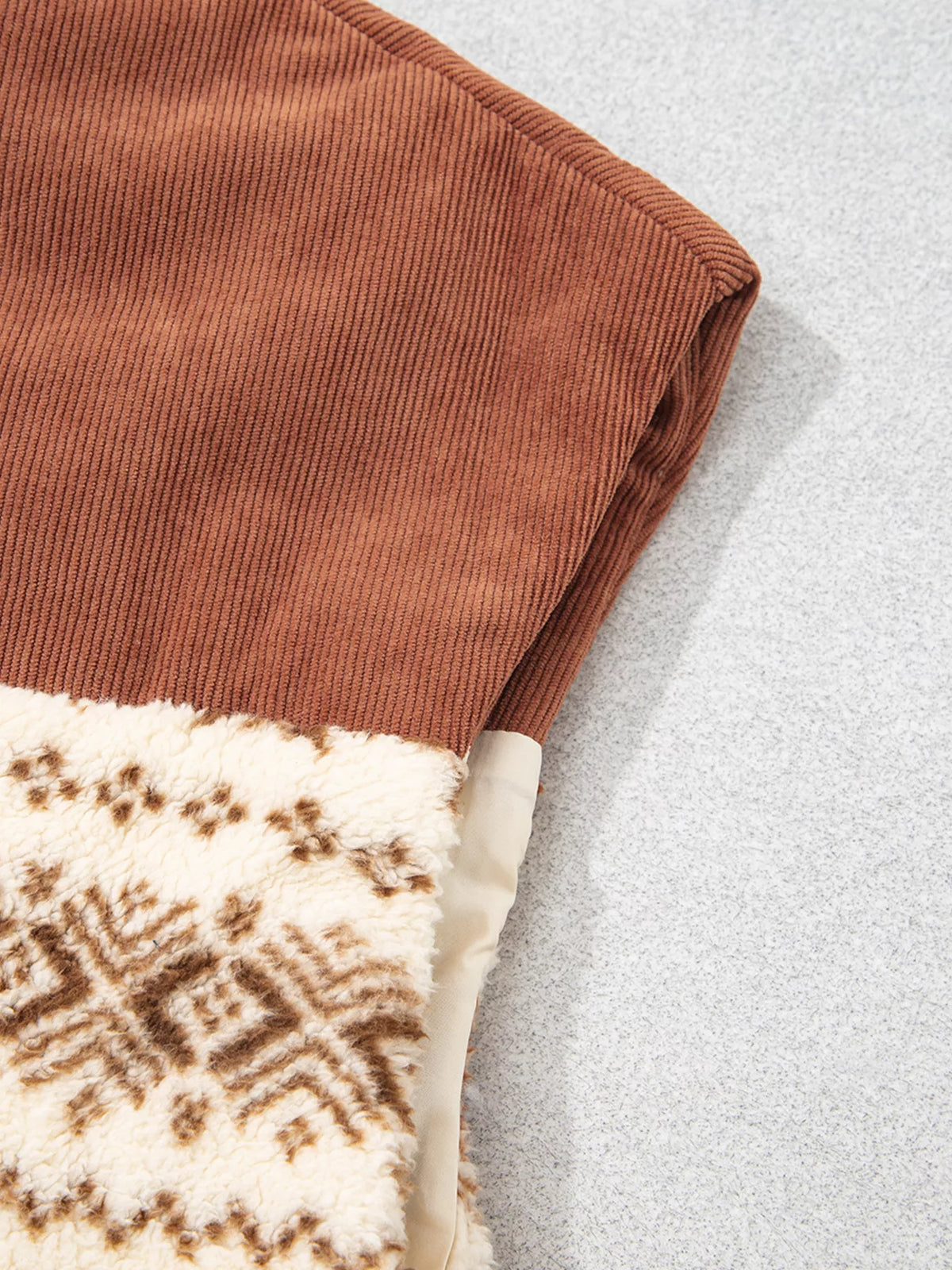 Geometric fleece vest, bound armhole