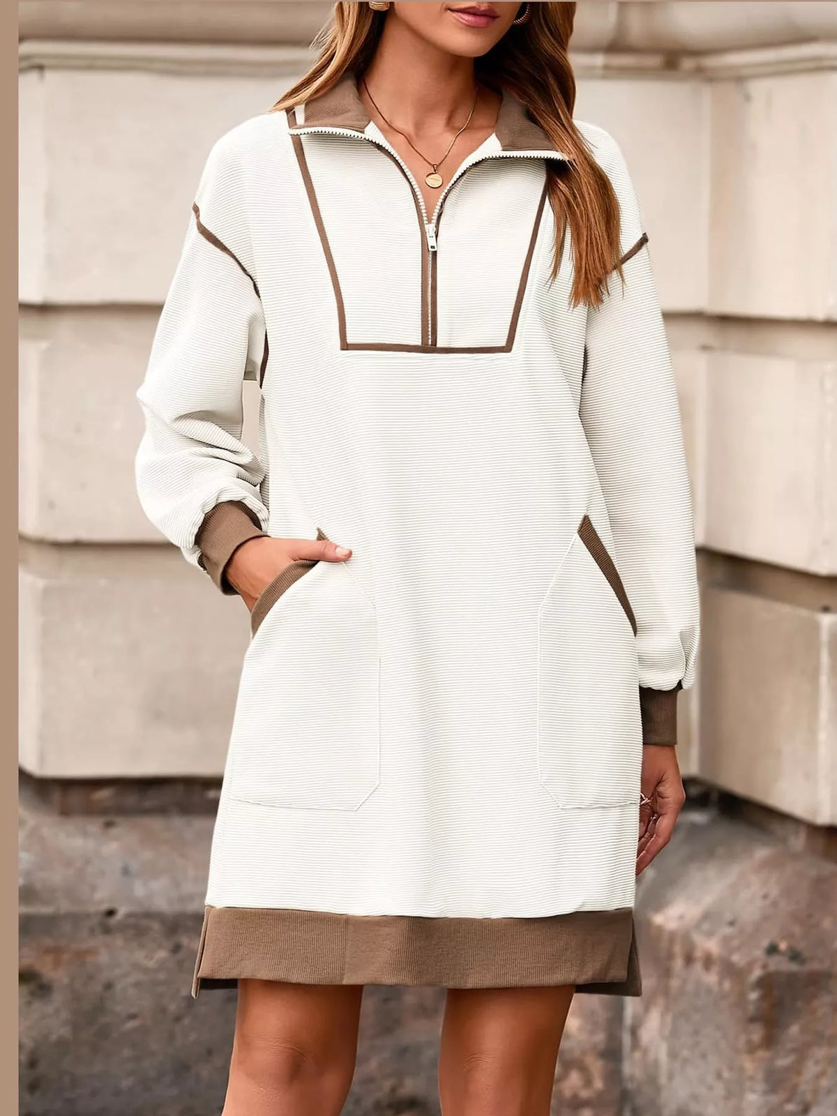 White and tan color block quarter-zip sweatshirt dress — front view