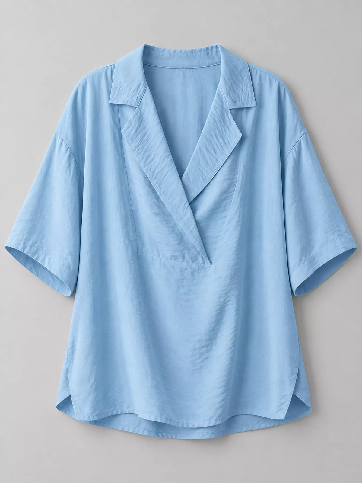 Half-sleeve blouse, blue hanging front