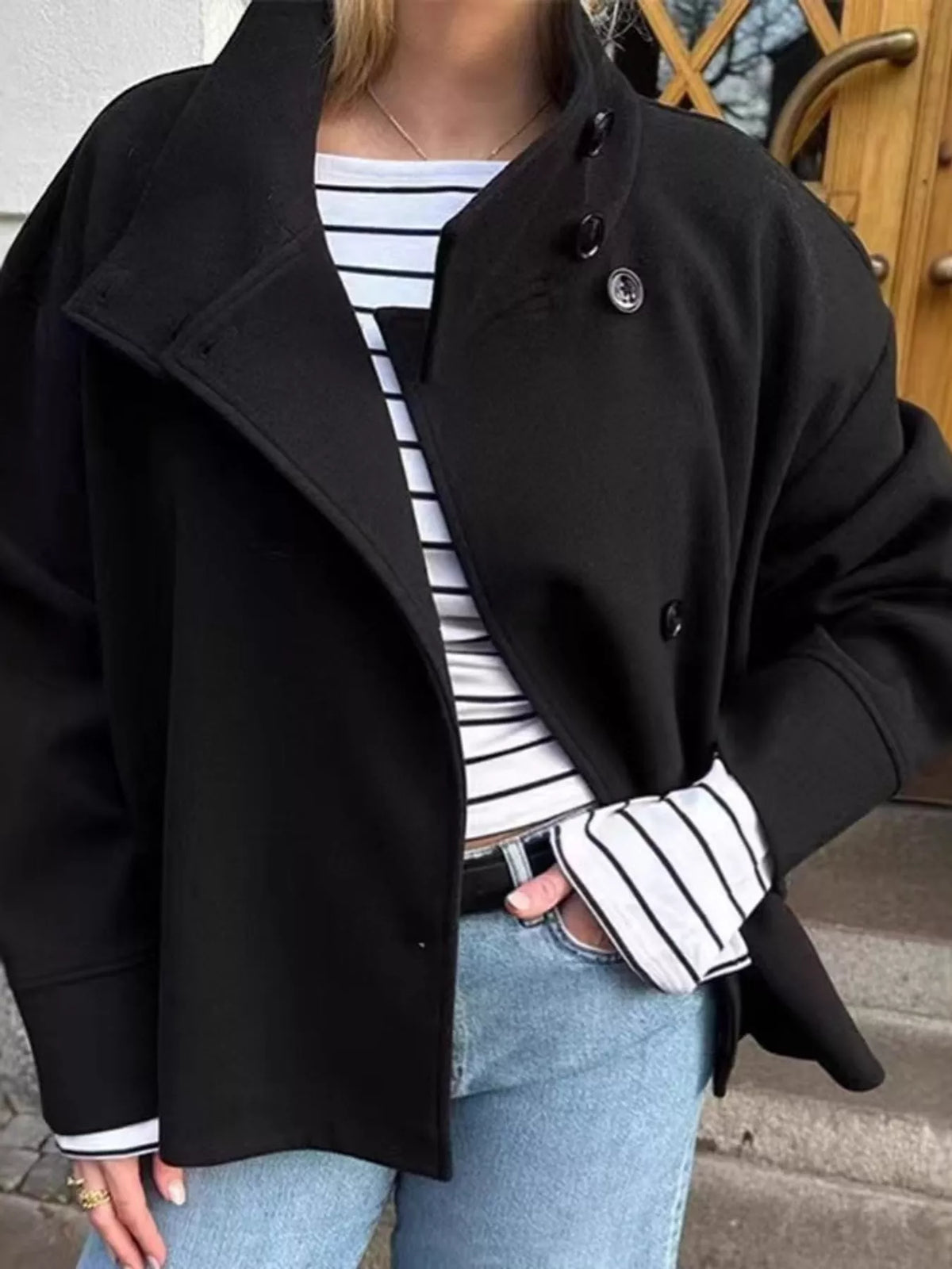 Black stand-collar button-up jacket