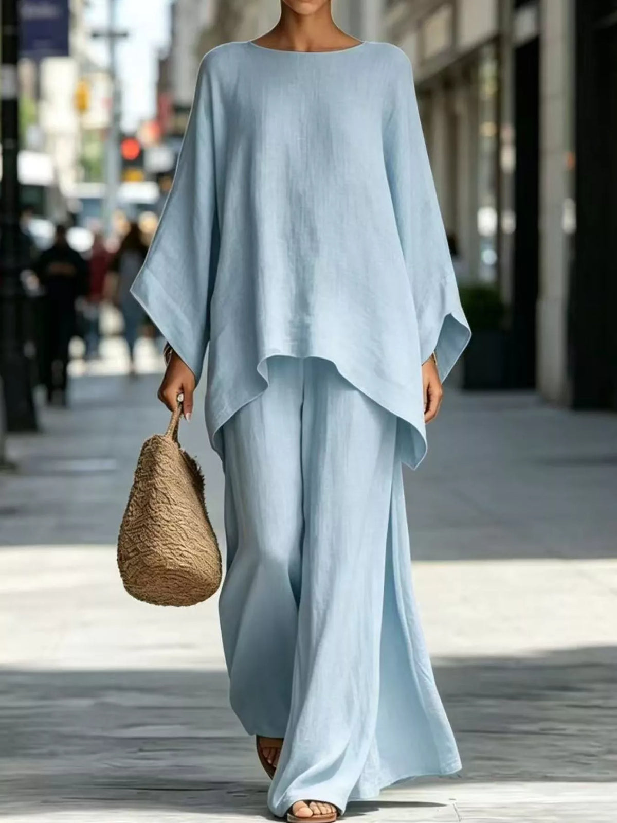 Light blue batwing top and wide-leg pants set, front view