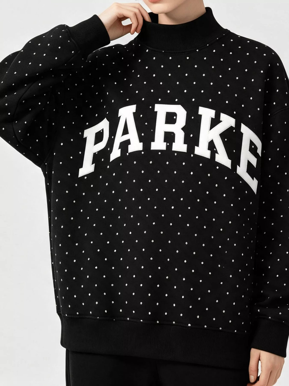 Black polka dot letter graphic sweatshirt