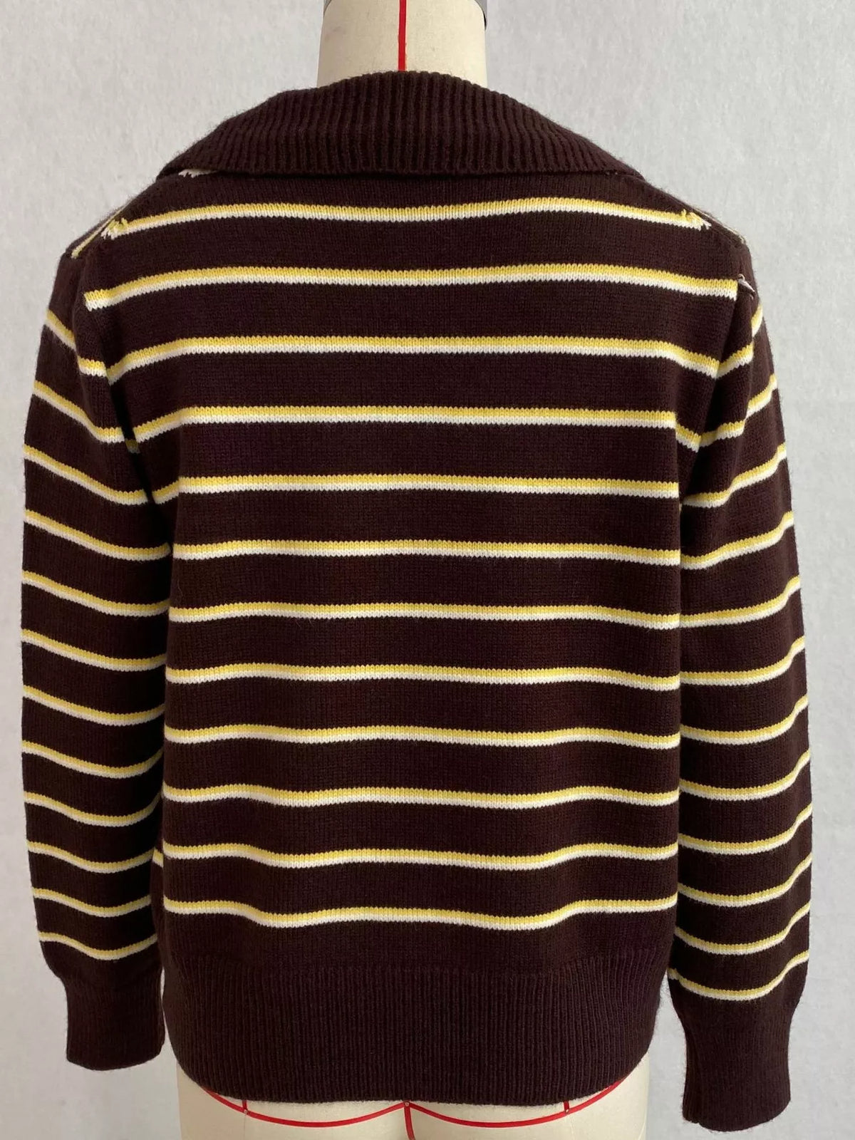 Brown and cream striped polo-collar sweater, back on dress form.