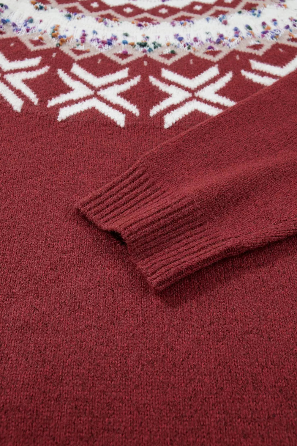 Burgundy Christmas geometric sweater, cuff detail
