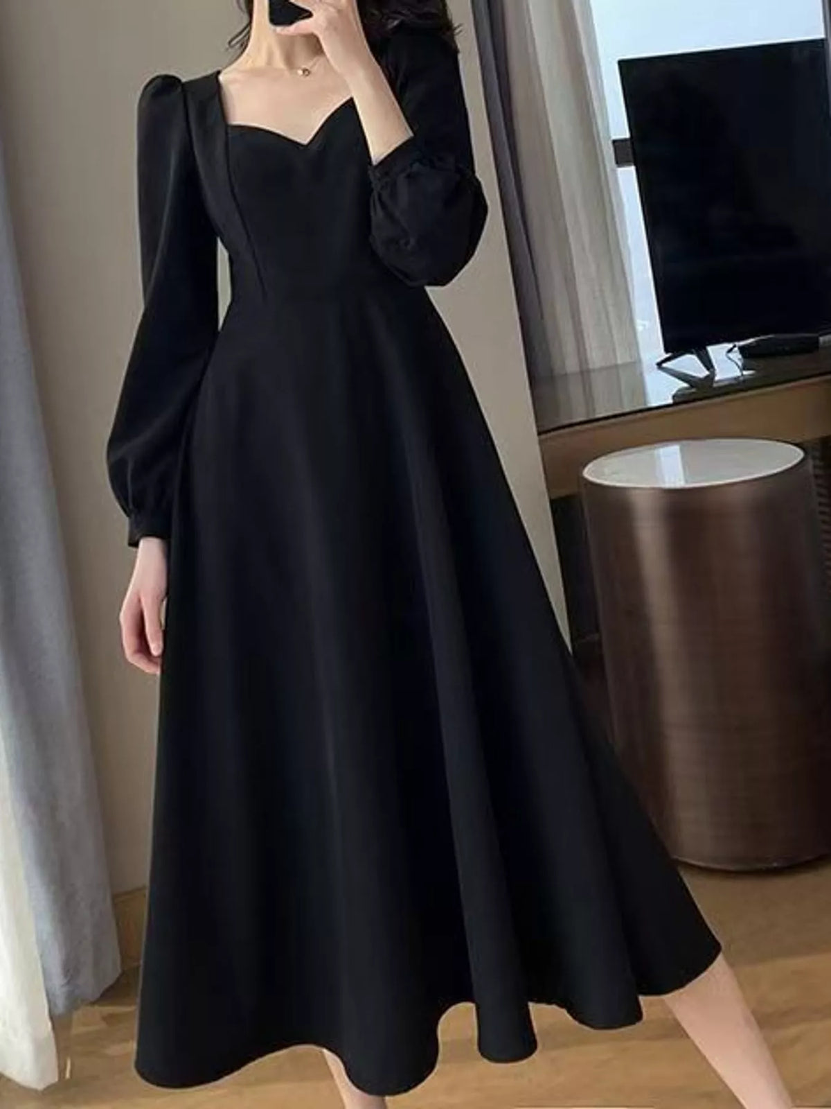 Black long sleeve a line midi dress, front view