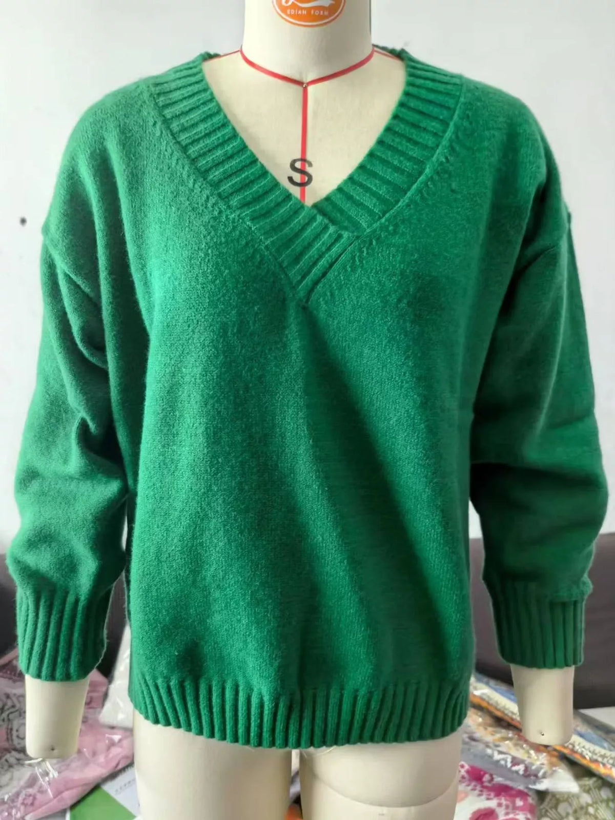 V-neck sweater, green mannequin front