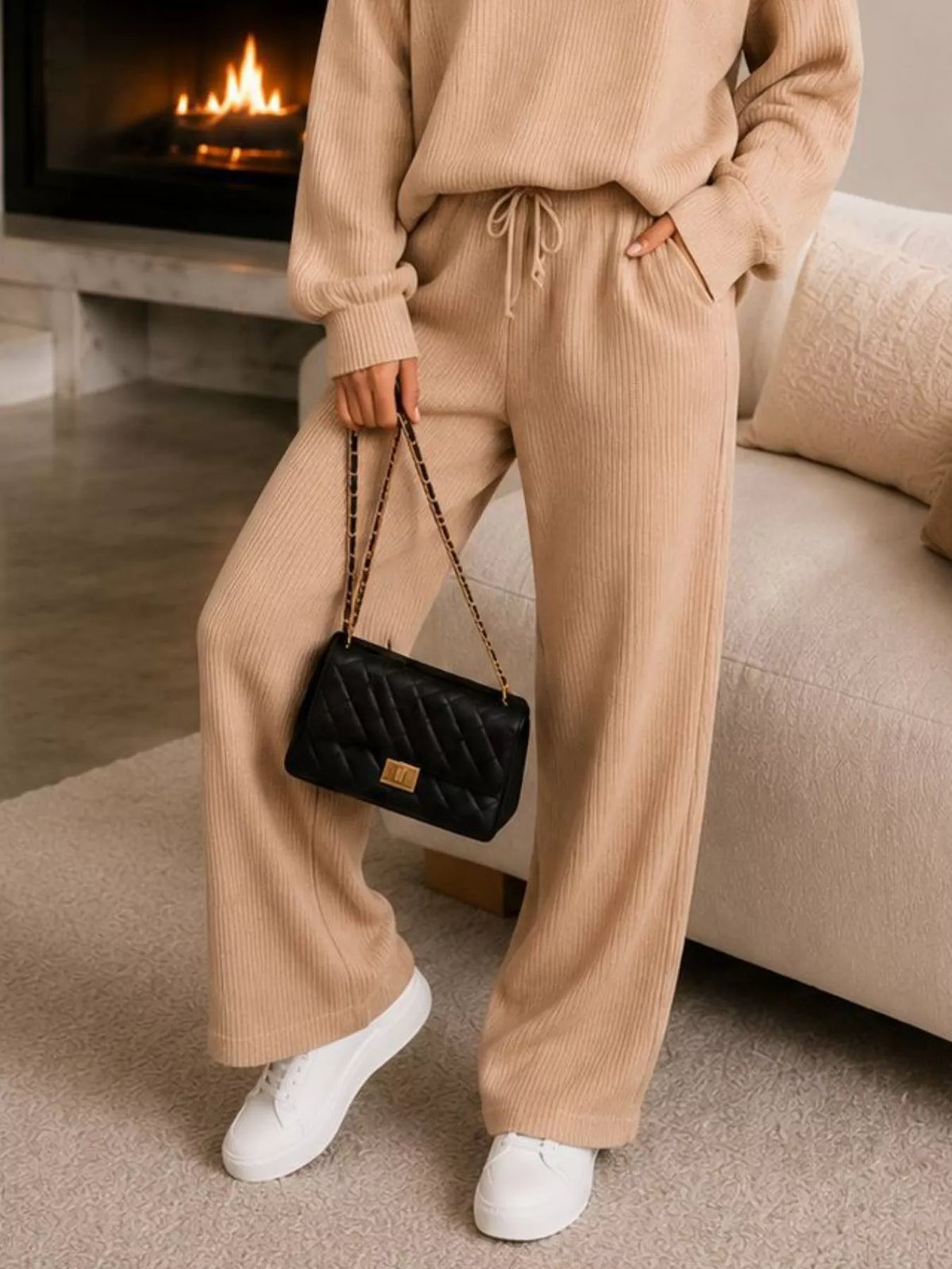 Beige quarter-zip knit top and pants set, pants detail