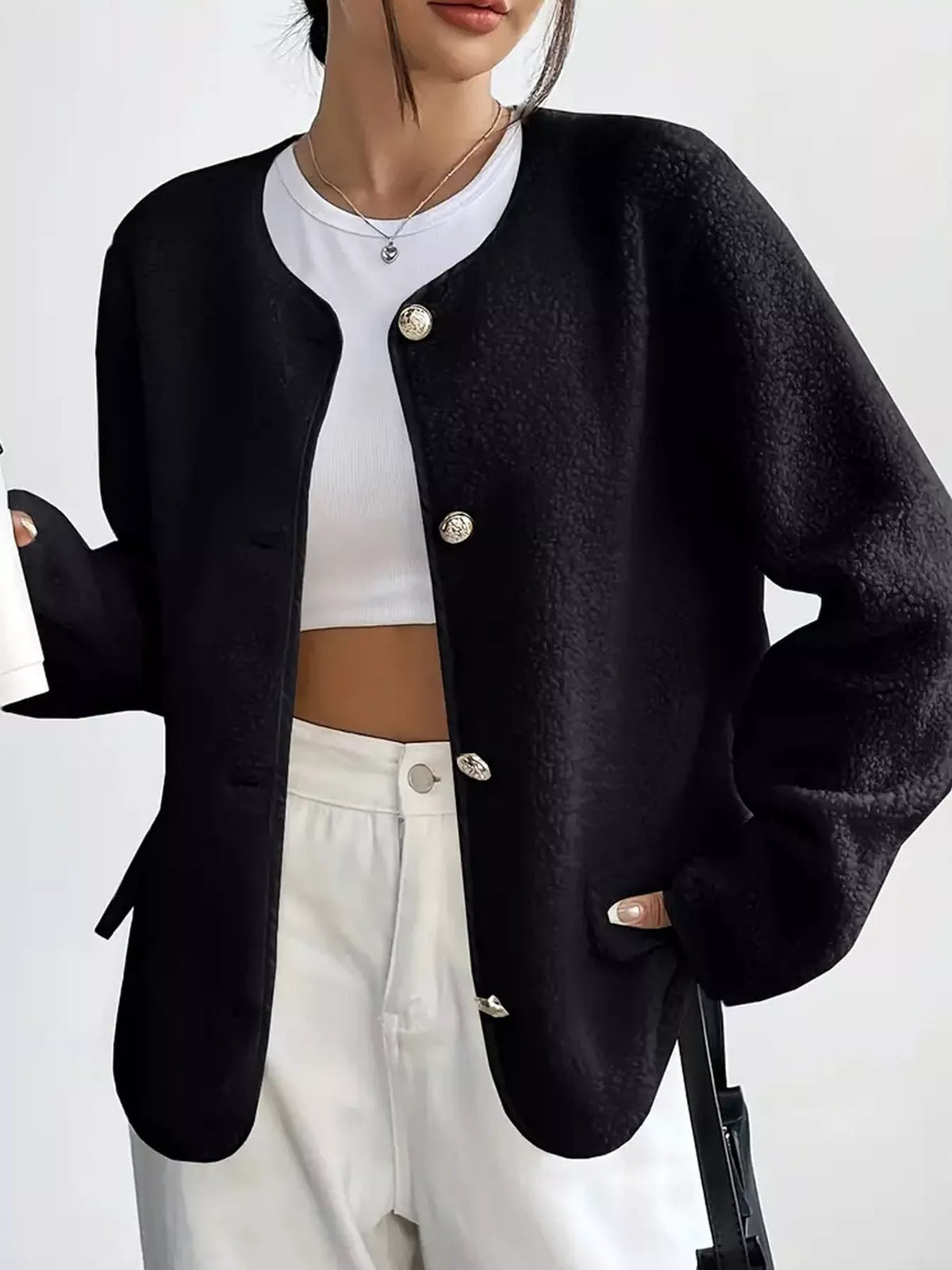 Black textured button-front jacket — front view