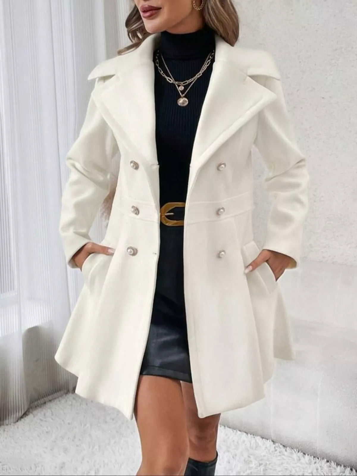 White double-breasted peplum coat, open front view