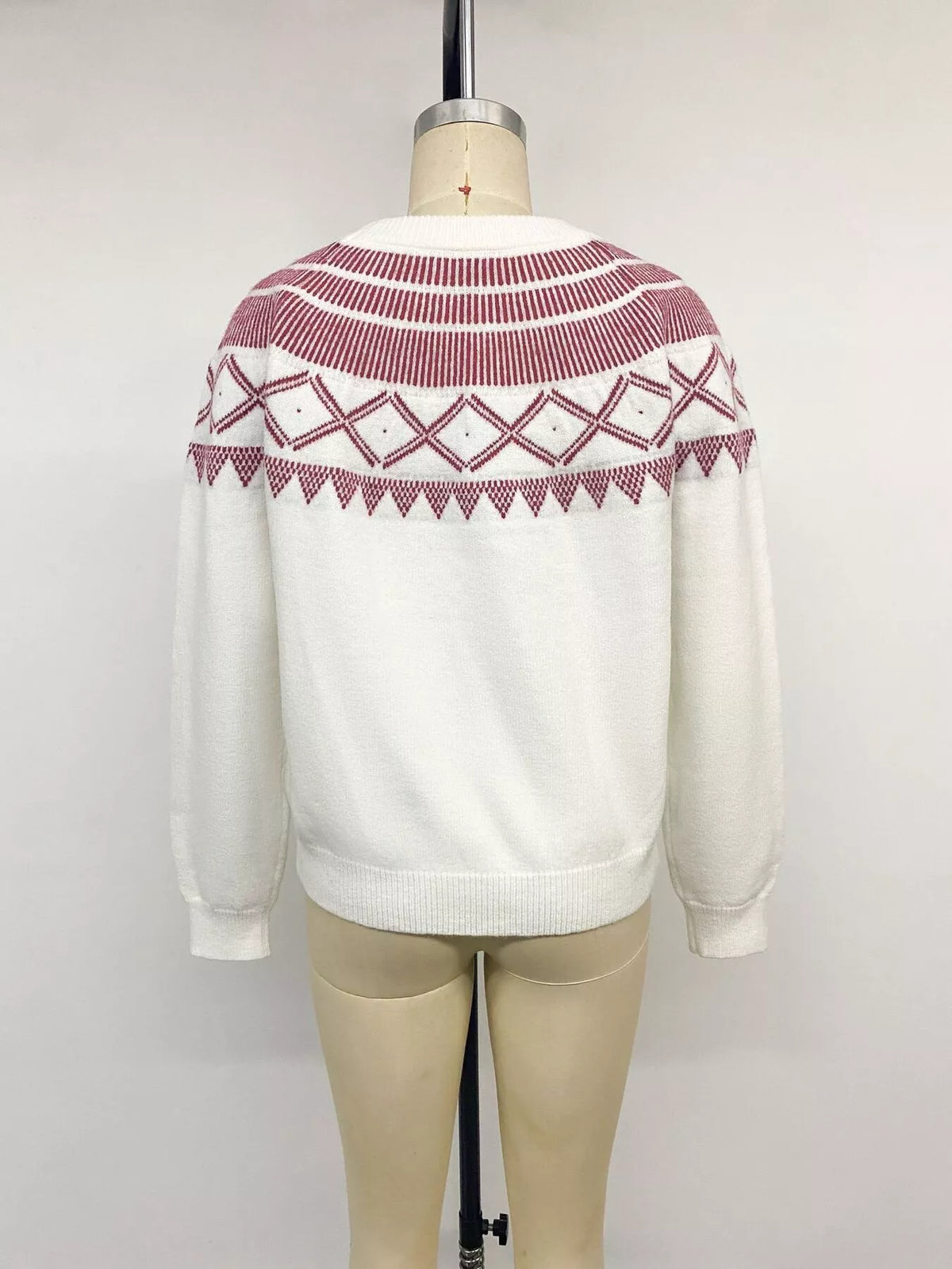 Cream geometric crew neck sweater, back on mannequin