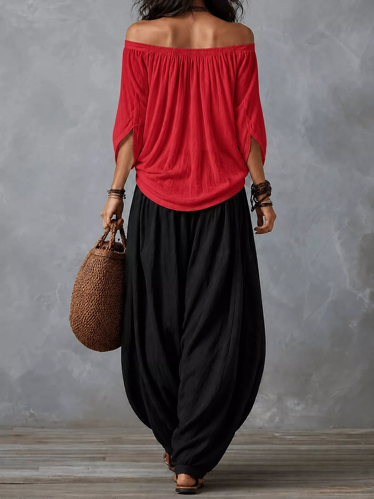 Red top and black pants off-shoulder top and wide-leg harem pants set — back view