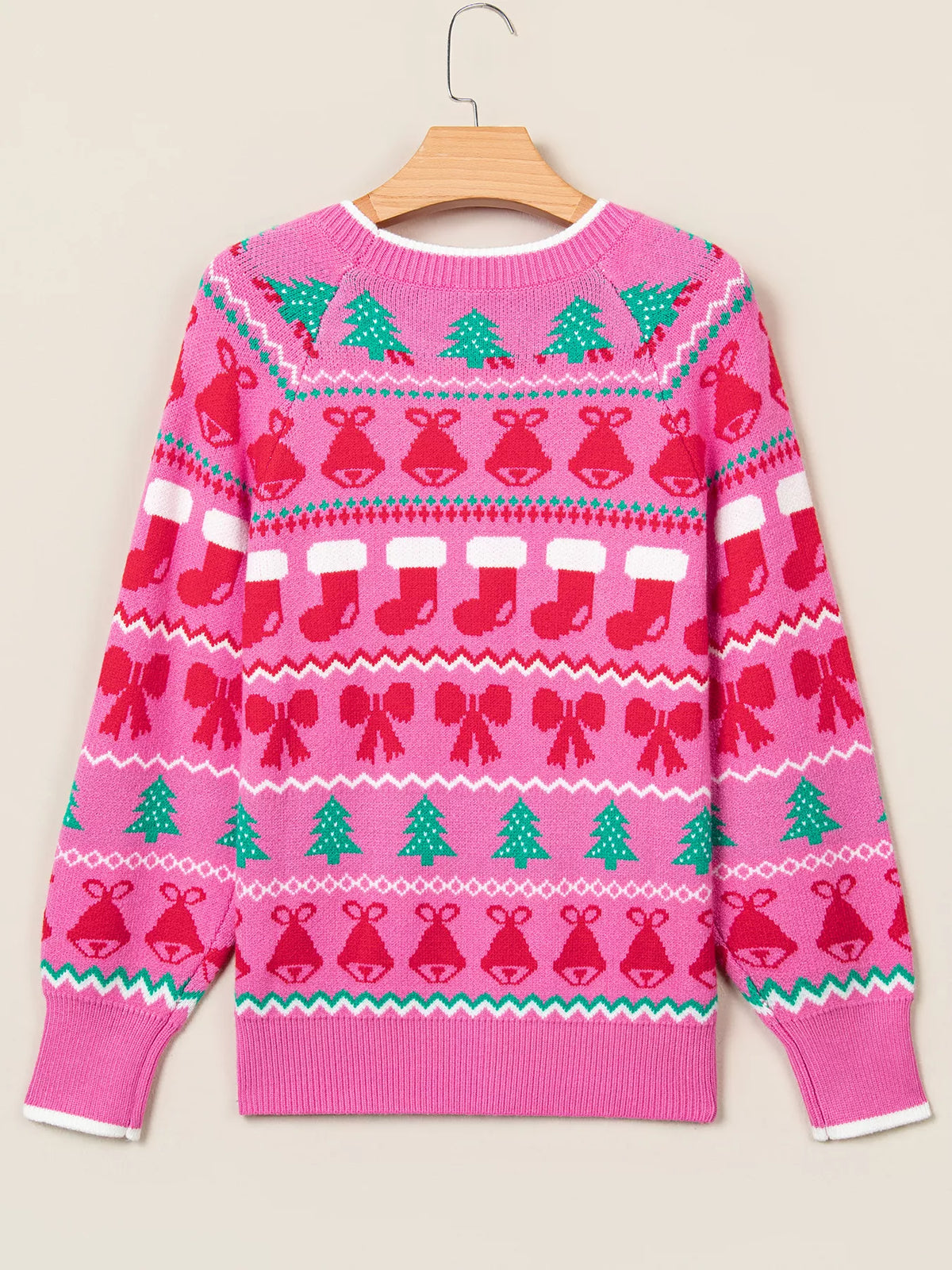 Pink Christmas graphic sweater, back on hanger