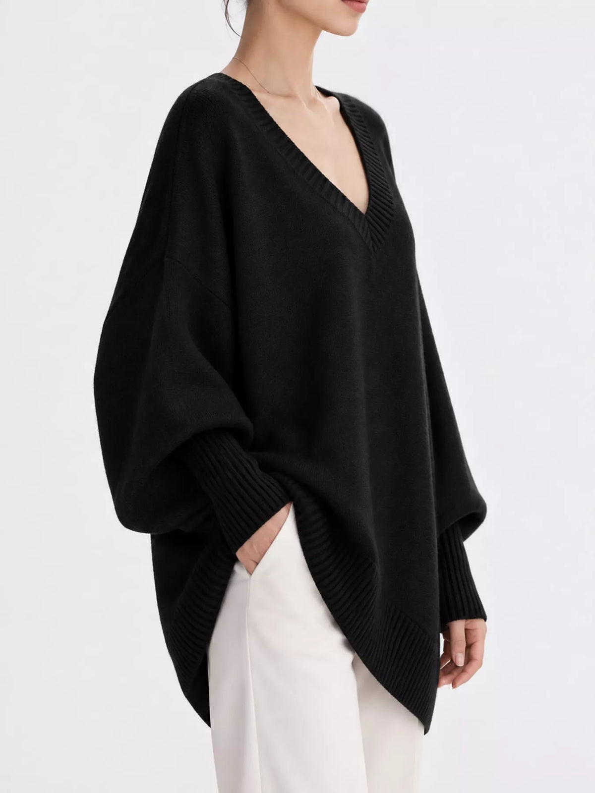 Batwing sweater, black side