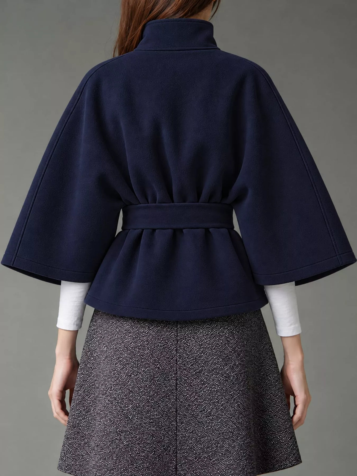 Navy belted button-front cape — back view