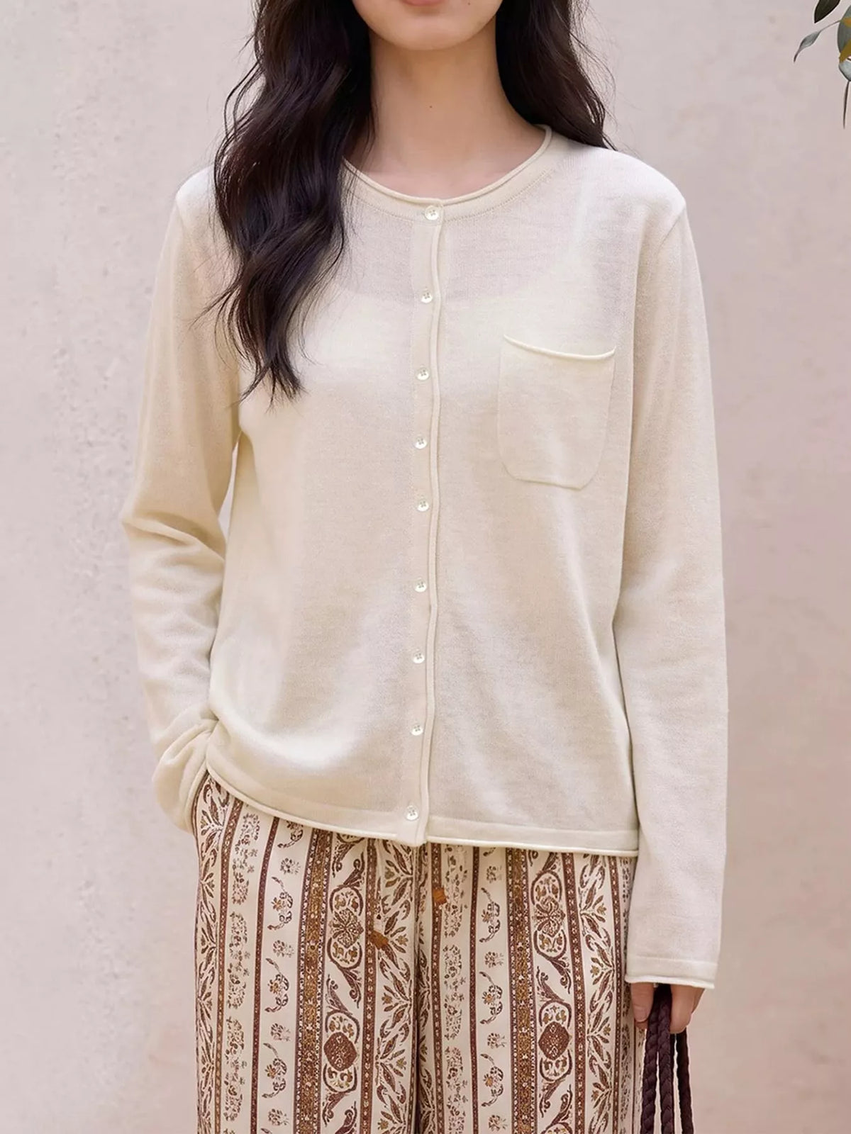 Round neck long sleeve cardigan, front view on model