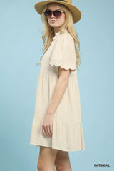 Trendsi Umgee Linen Tiered Babydoll Dress with Scalloped Sleeves -