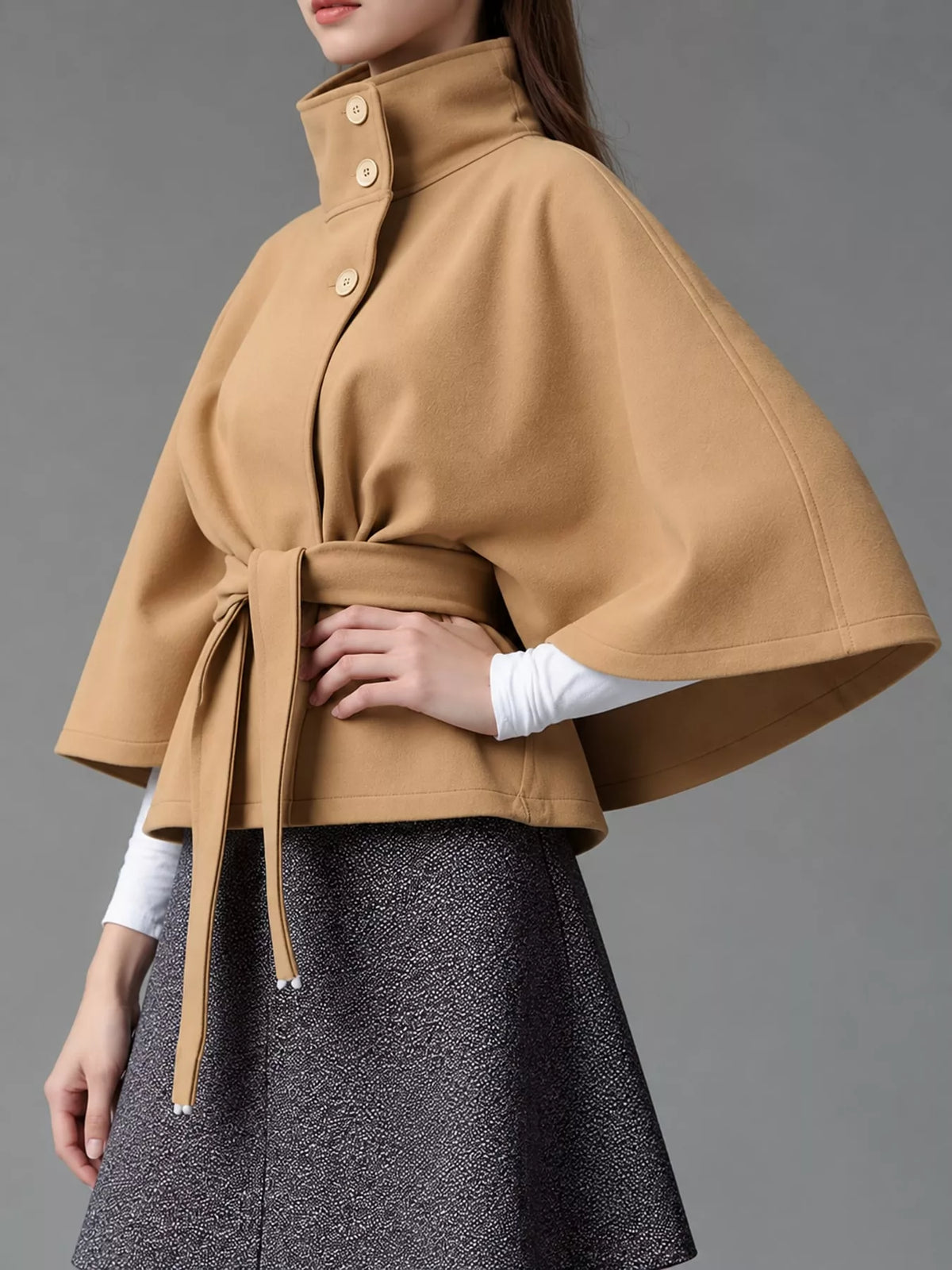 Tan belted button-front cape — side view