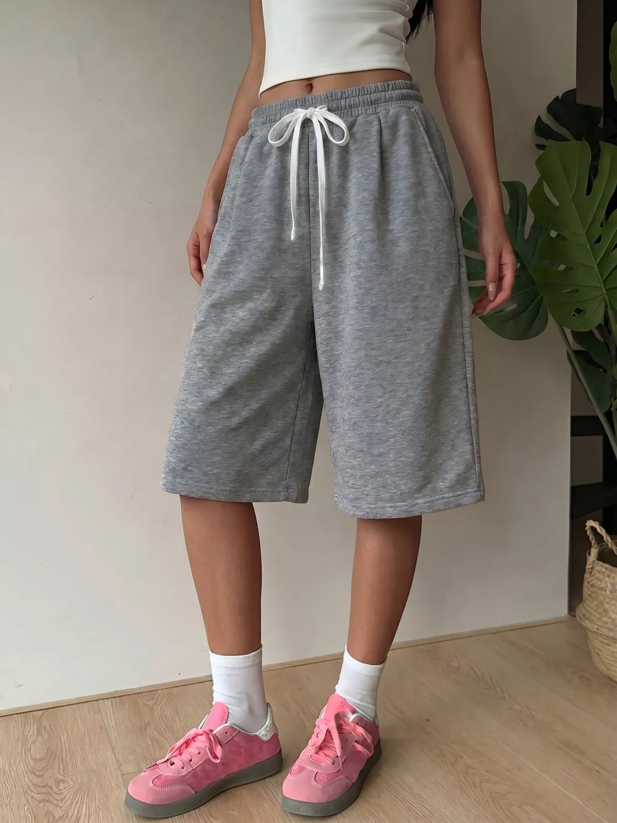 High-Waisted Drawstring Shorts in gray, front view