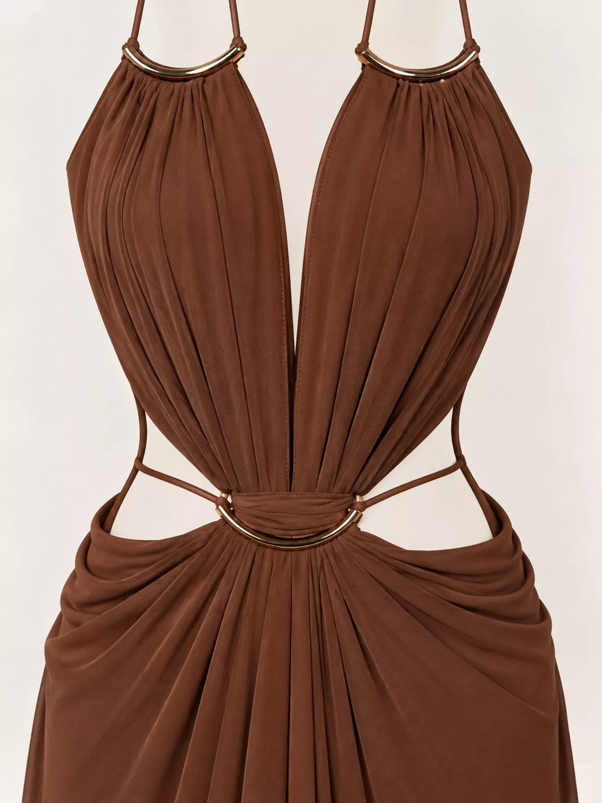 Brown backless plunge cut-out maxi dress, halter neckline, gathered bodice, and waist cutouts