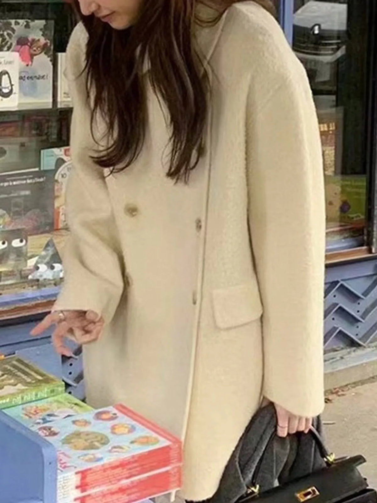 Cream double-breasted wool-blend coat — front view