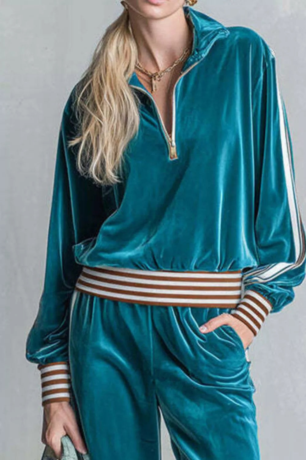 Teal striped half-zip top and pants set, zip neckline detail