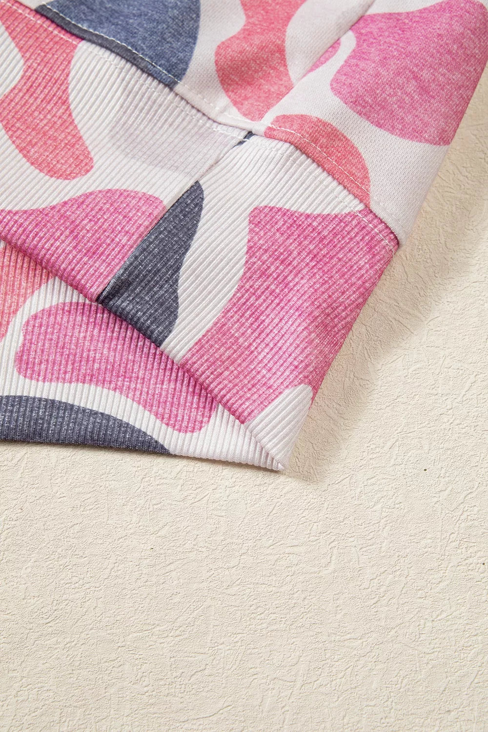 Pink camouflage Howdy sweatshirt, hem detail