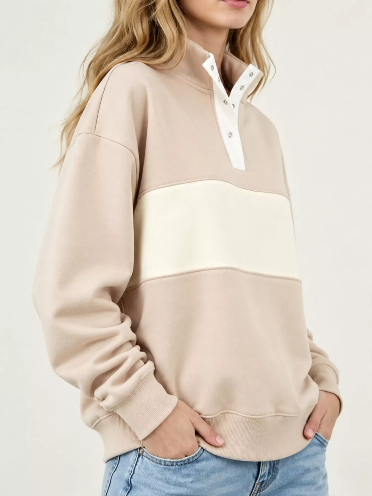 Beige and cream color block snap-button sweatshirt, side view