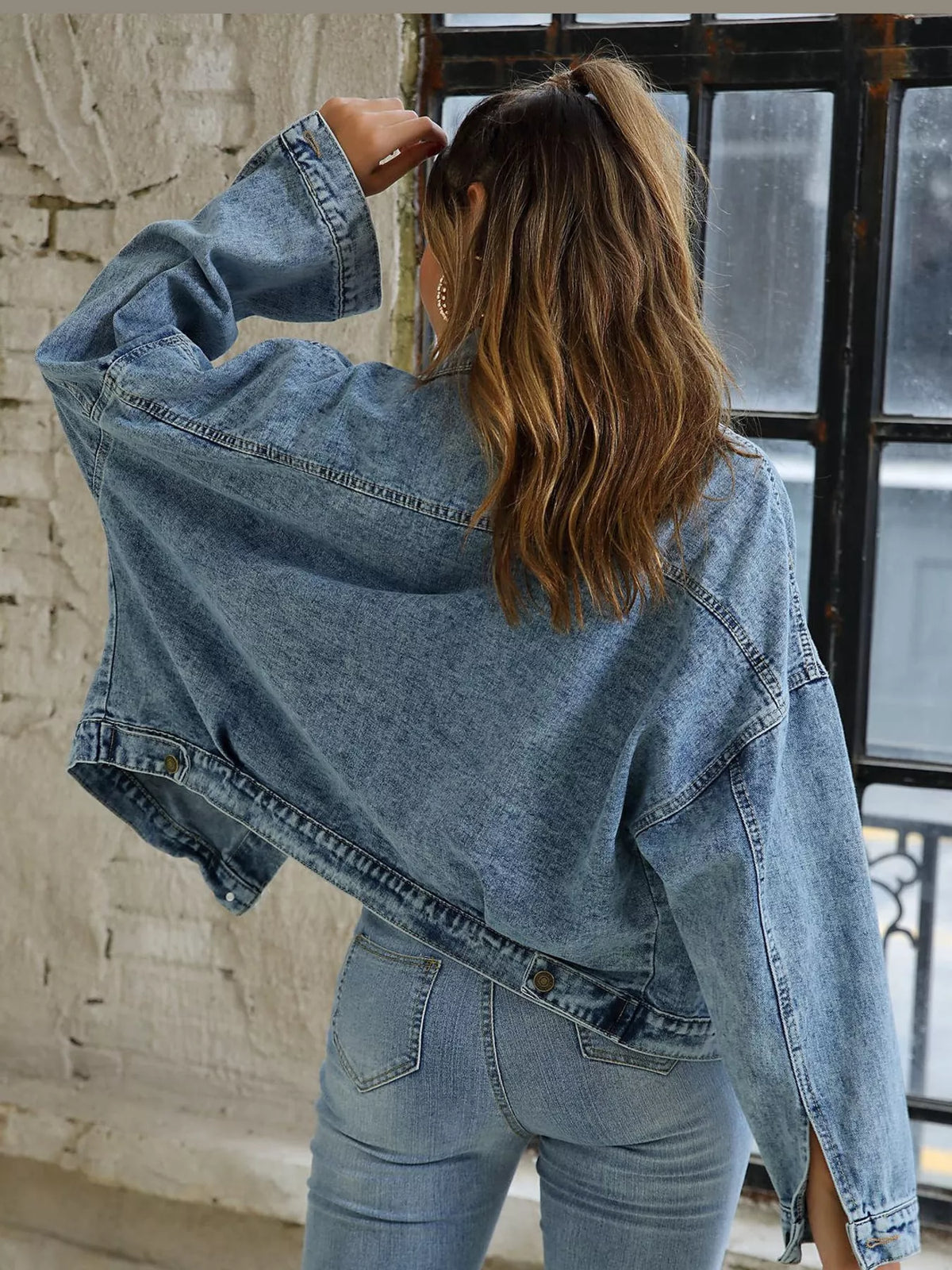 Blue button-up dropped shoulder denim jacket — back view