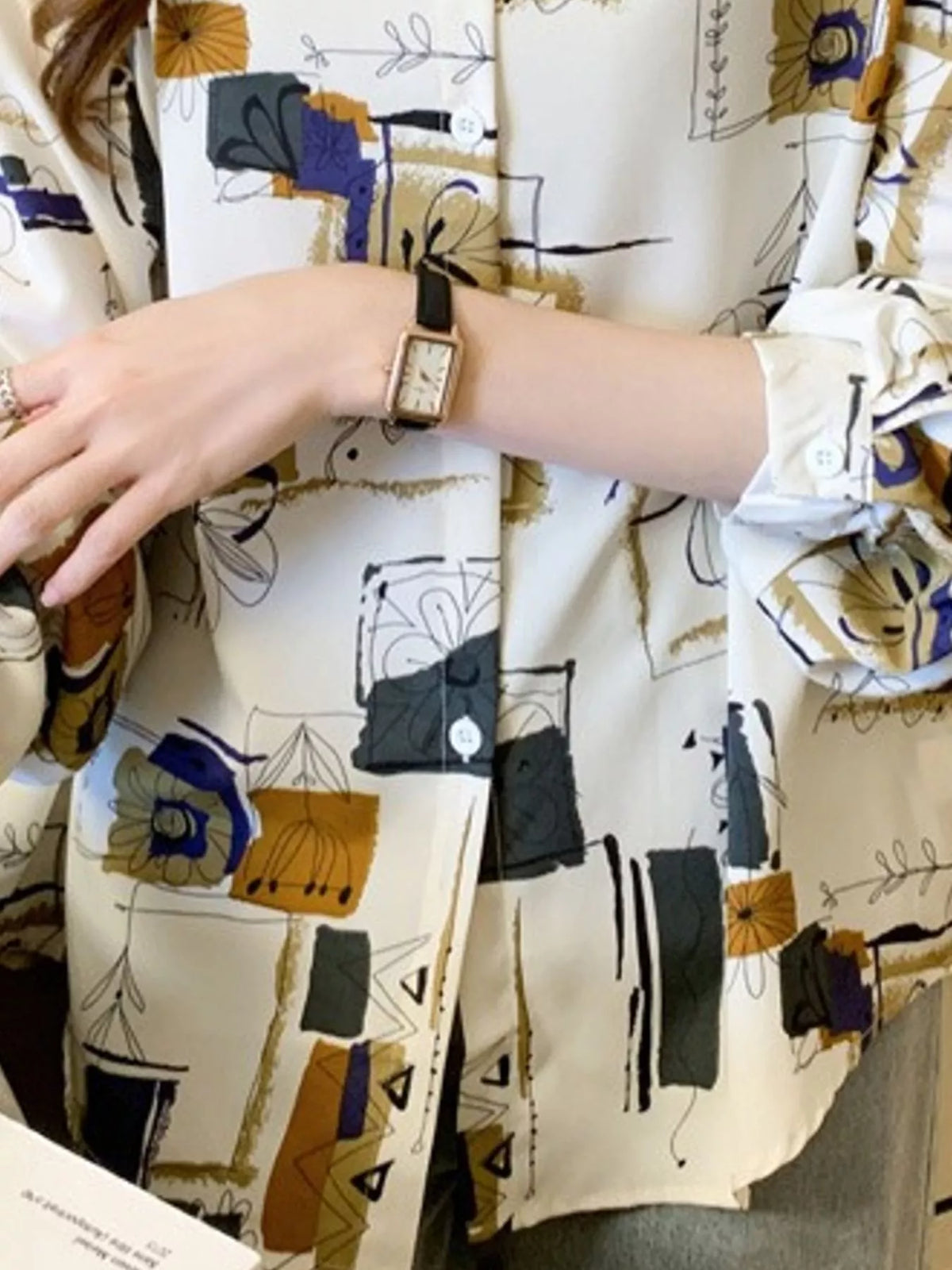 Printed Long Sleeve Button-Down Shirt, detail view in white with multicolor print