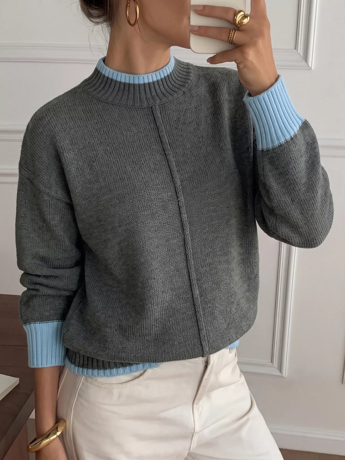 Gray sweater with blue contrast trim, front view