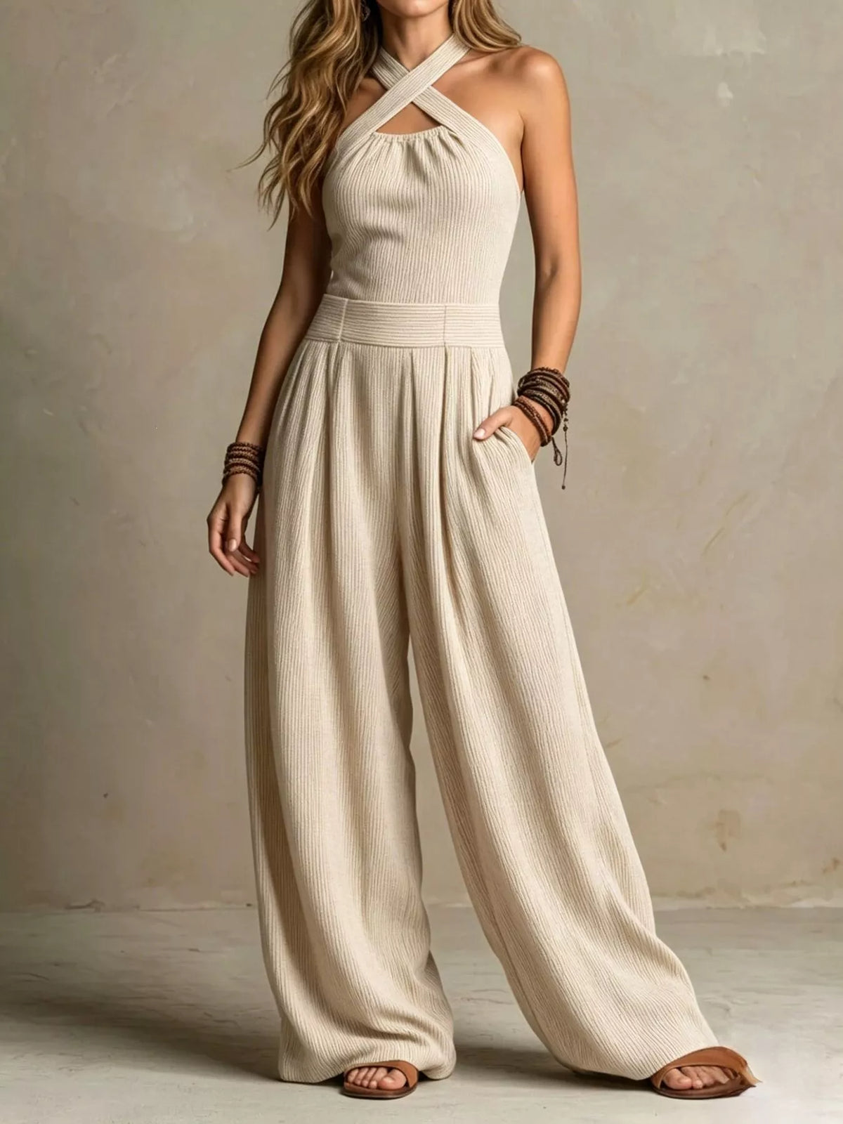 Beige halter-neck wide-leg jumpsuit, front view